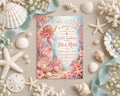 A mermaid-themed baby shower invitation featuring a mermaid, seashells, pearls, and starfish arranged around it.