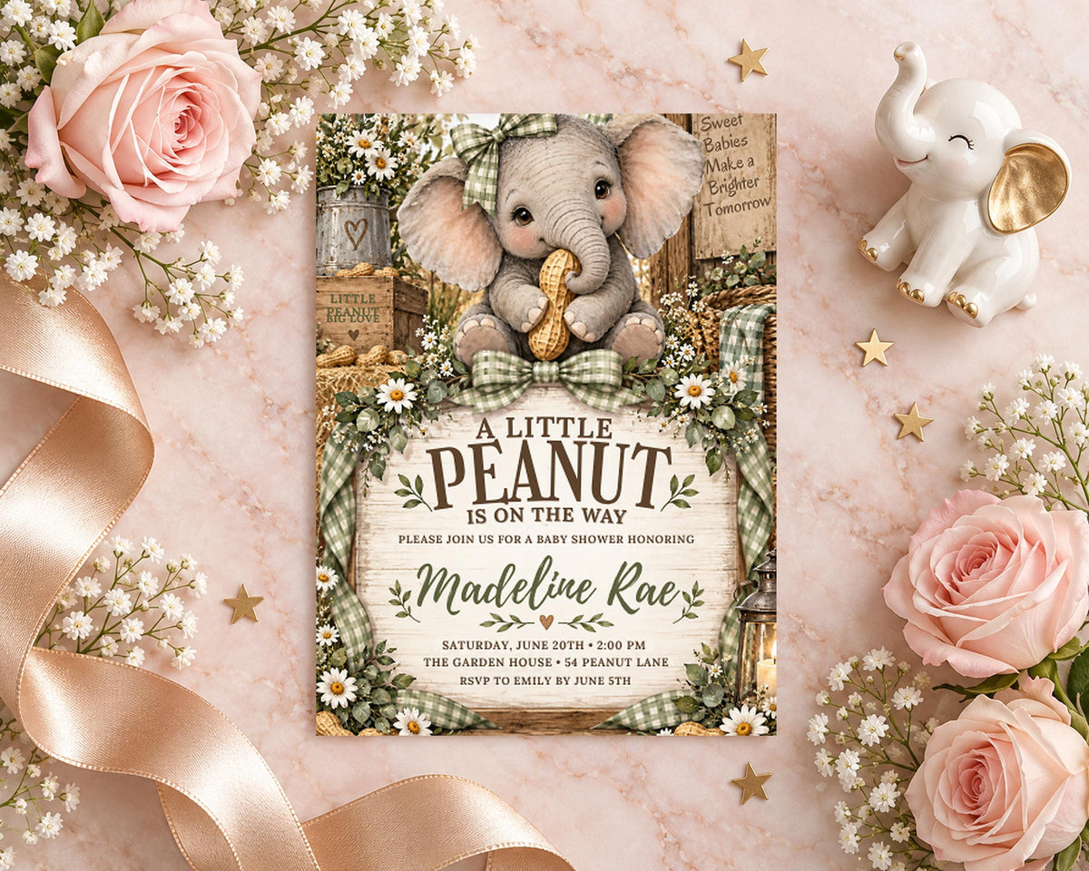 A baby shower invitation featuring an elephant and floral decorations, surrounded by pink roses and a small elephant figurine.