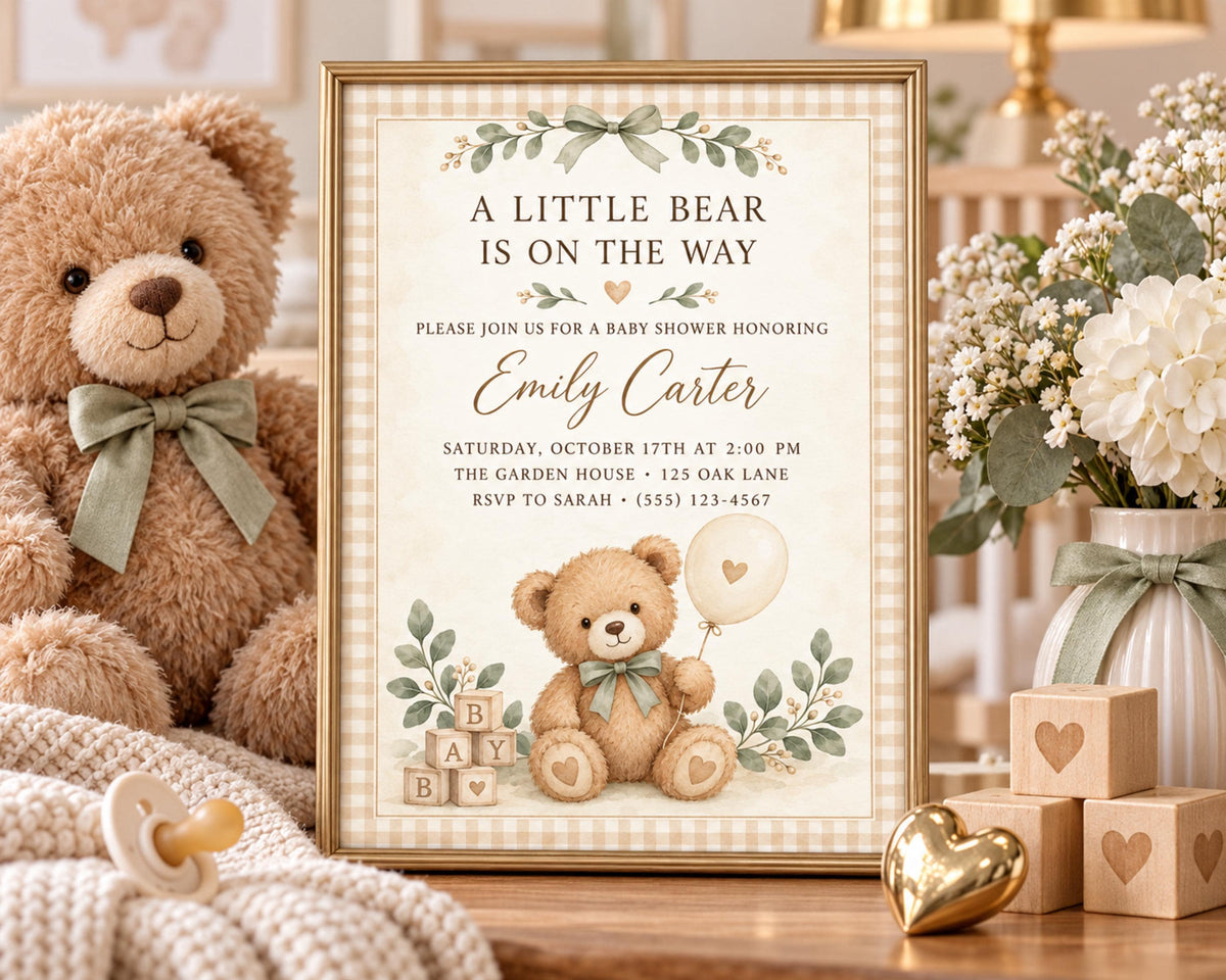 A framed baby shower invitation for Emily Carter, featuring a teddy bear and baby-themed decorations, with a teddy bear and wooden blocks on a table in the background.