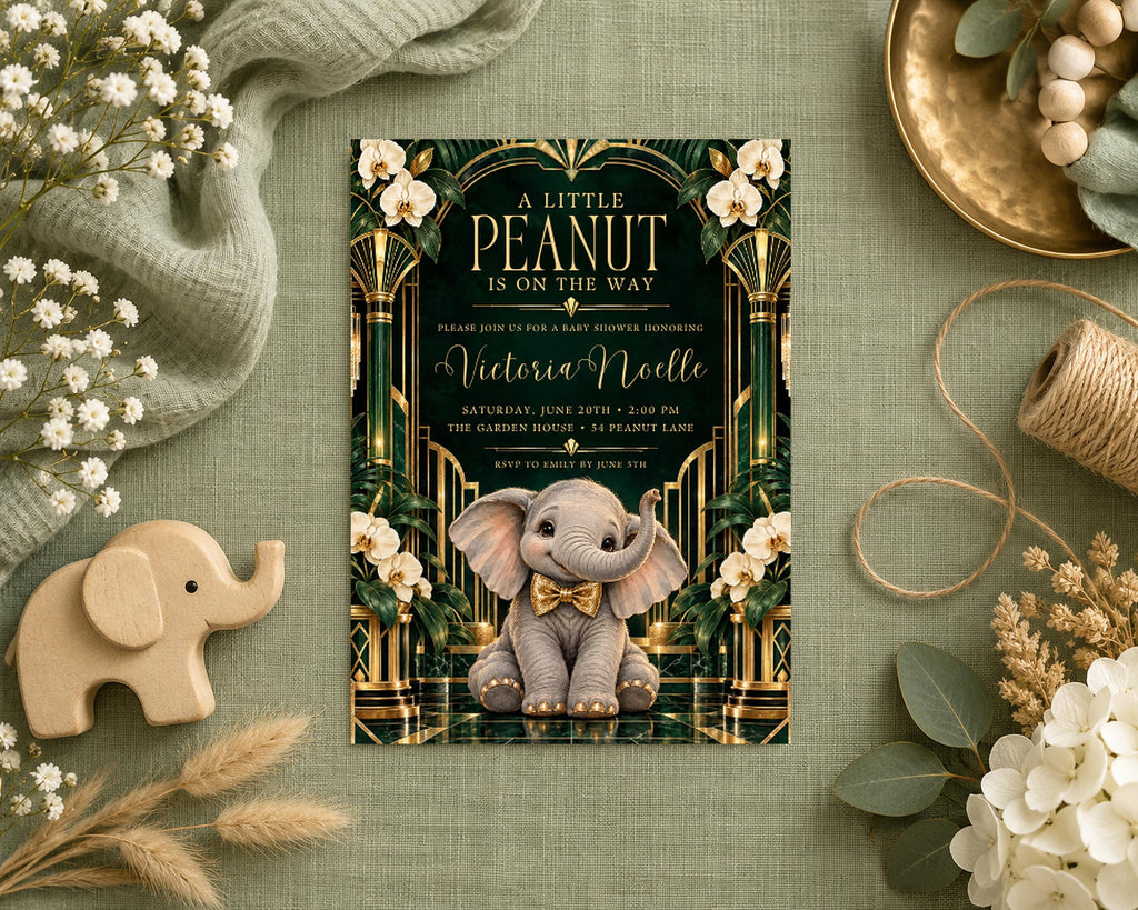 a baby shower invitation with a baby elephant and floral designs, surrounded by various decorative items such as a wooden elephant, flowers, and a bowl.
