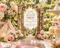 a beautifully decorated wedding invitation with a garden scene and pink flowers, placed on a table with a vase of flowers and a plate of cupcakes.