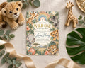 a baby shower invitation for a baby named Lucas Henry, surrounded by various baby-themed items such as stuffed animals, a giraffe figurine, and a leaf.