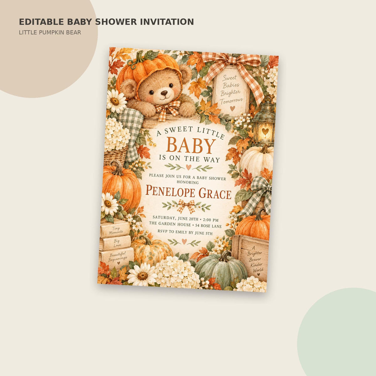 The image is an editable baby shower invitation featuring a pumpkin theme with a teddy bear, pumpkins, and fall decorations.