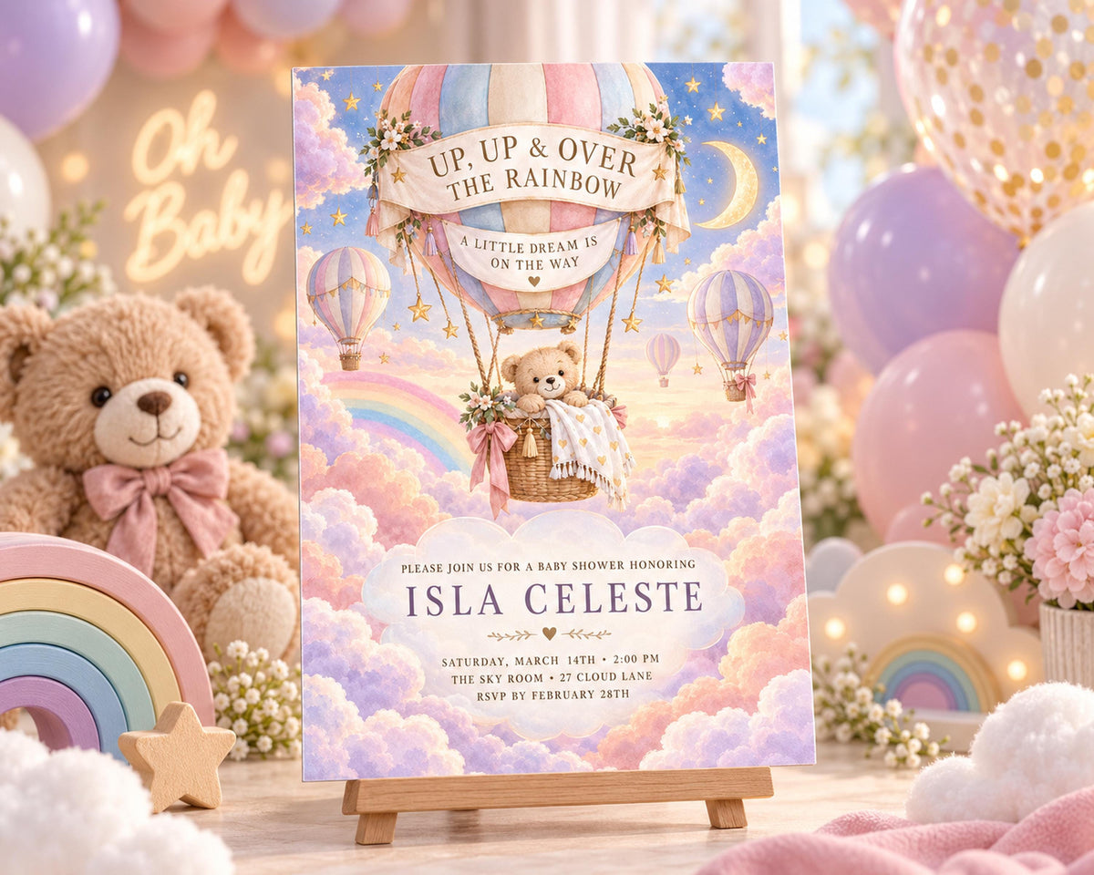 The image is a baby shower invitation featuring a teddy bear in a hot air balloon, surrounded by balloons and a rainbow.