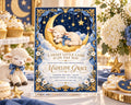 A baby shower invitation featuring a lamb sleeping on a crescent moon, surrounded by stars and flowers, with a blue and gold color scheme.