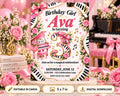 The image is a birthday invitation for a girl named Ava, who is turning 3 years old. The invitation features a piano and musical notes, along with pink and white floral decorations. The background is pink and white, and there are books and flowers visible in the scene. The invitation invites guests to a magical celebration and provides details about the event, including the date, time, location, and RSVP information.