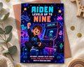 The image is a colorful invitation card for a gaming-themed birthday party, featuring a young boy playing a video game and surrounded by various gaming elements.