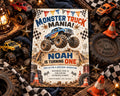 The image is a birthday party invitation for a child named Noah, featuring a monster truck theme. The invitation is surrounded by various monster truck toys and decorations, including a checkered flag, tires, and cones.