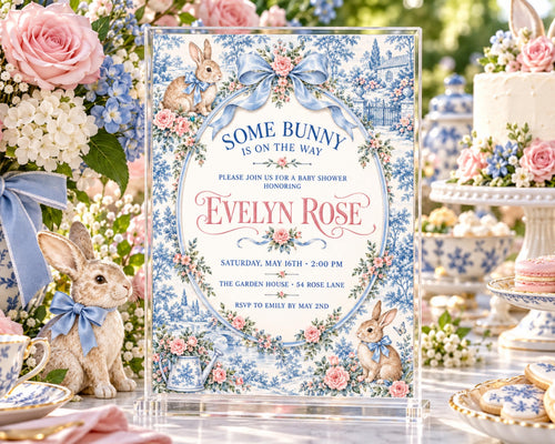 The image is a baby shower invitation featuring a blue and white floral design with illustrations of rabbits and a teapot. The text invites guests to a baby shower honoring Evelyn Rose and provides details about the event, including the date, time, location, and dress code.