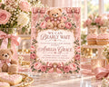The image is a pink and white baby shower invitation featuring a teddy bear design, surrounded by pink flowers and bows.
