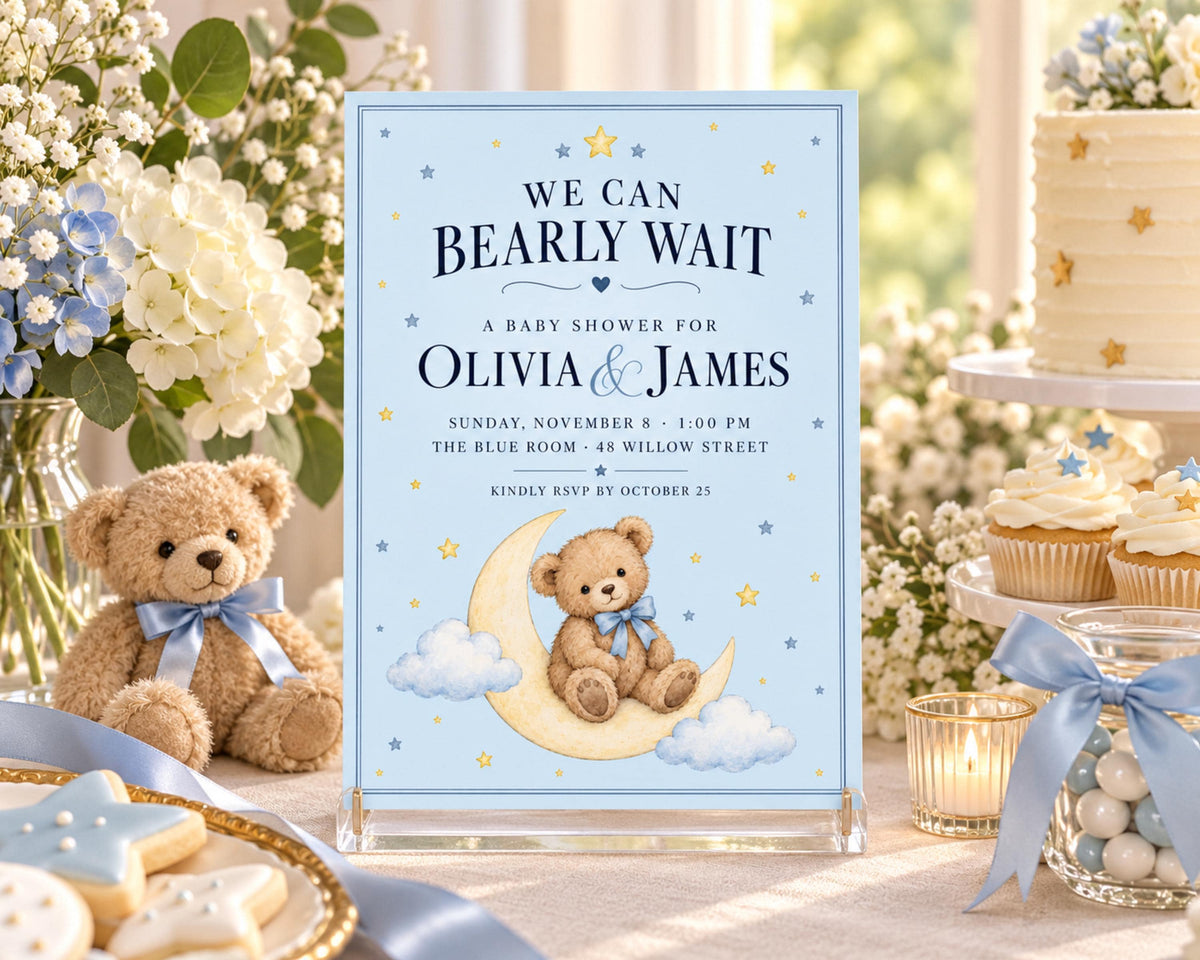 The image is a baby shower invitation featuring a teddy bear on a crescent moon, surrounded by flowers and other baby-themed decorations.