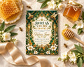 a beautifully designed invitation card for a baby shower, surrounded by honey, flowers, and honeycombs.