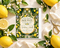 a wedding invitation with a lemon and flower design, surrounded by lemons, flowers, and a pair of scissors.
