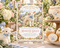 A sweet little lamb-themed baby shower invitation featuring a lamb illustration, surrounded by flowers and other baby shower decorations.