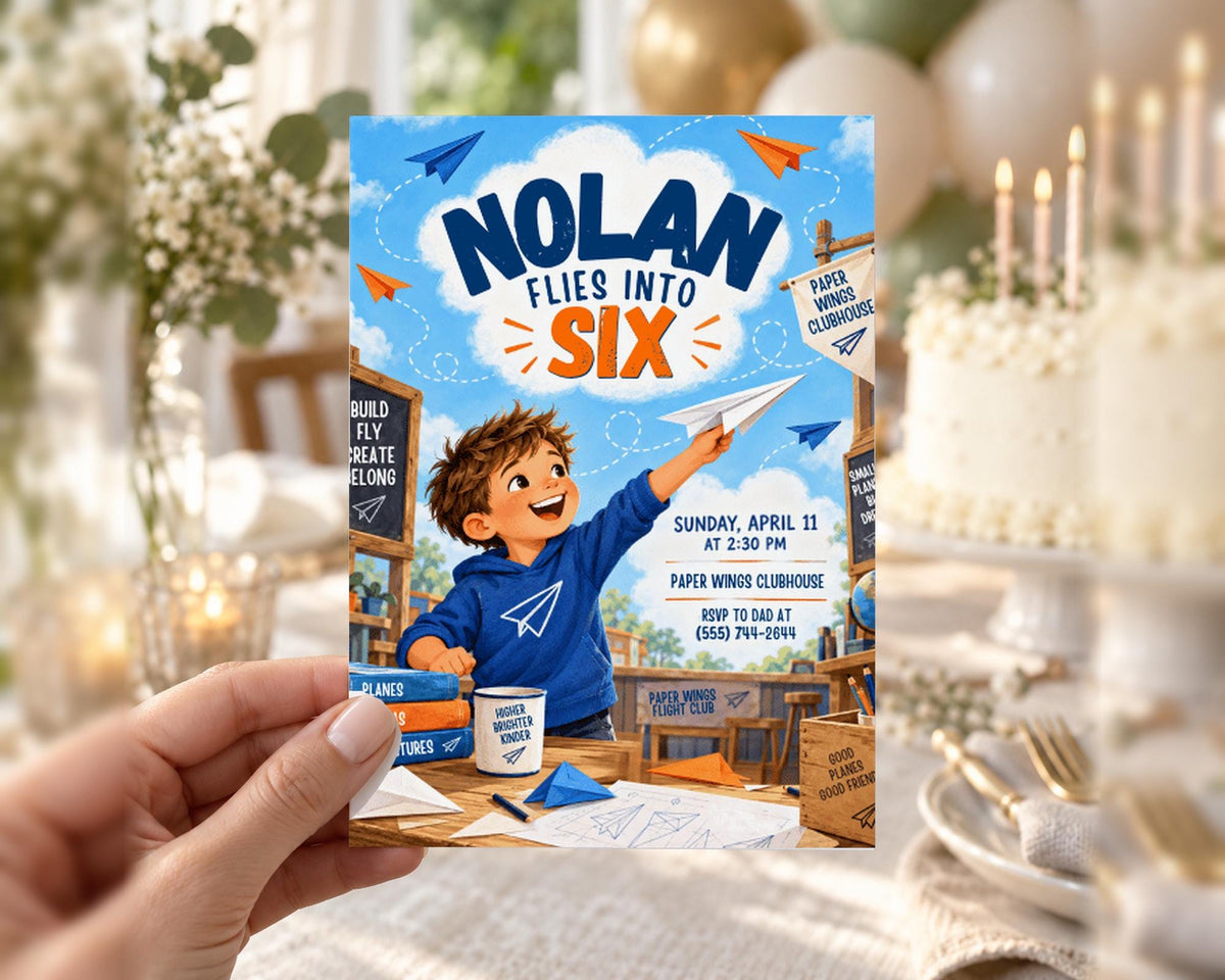 a hand holding a colorful invitation card with an illustration of a young boy playing with a paper airplane.